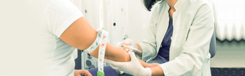 A provider gives a Premise Health member a biometric screening